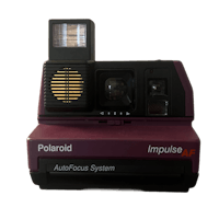 a polaroid instant camera with a light on it